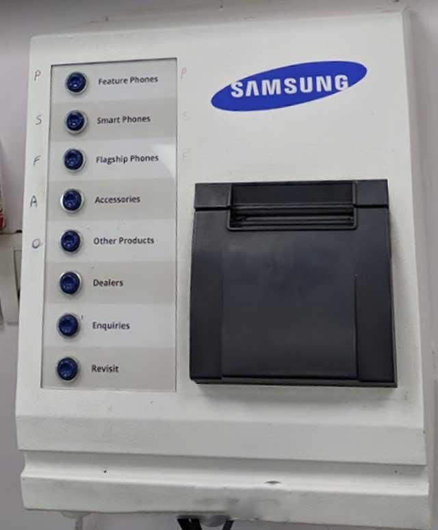 samsung service center Delhi token machine